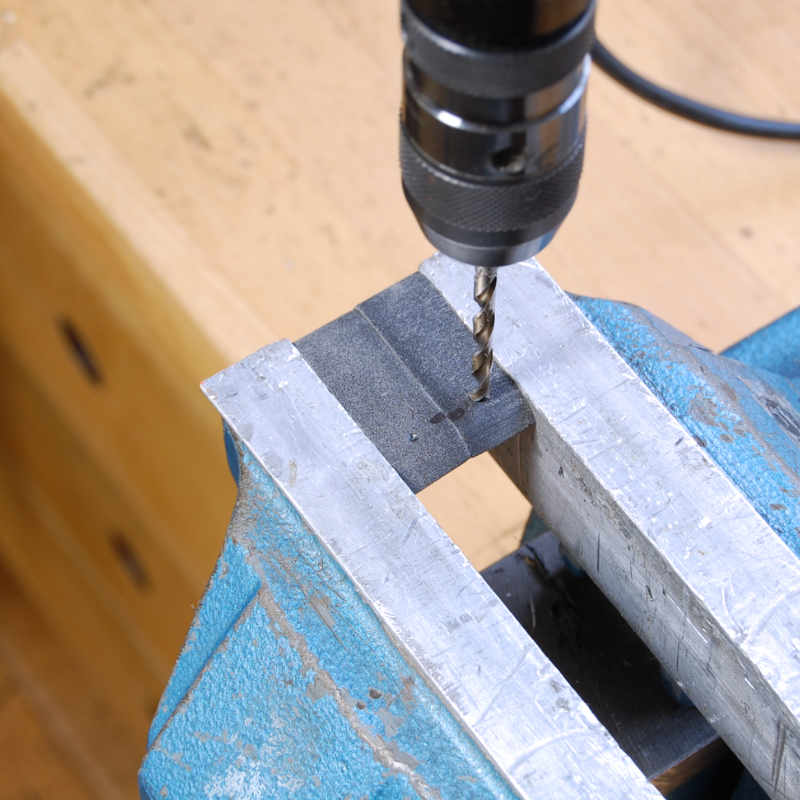 drill holes in the stabilizing feet